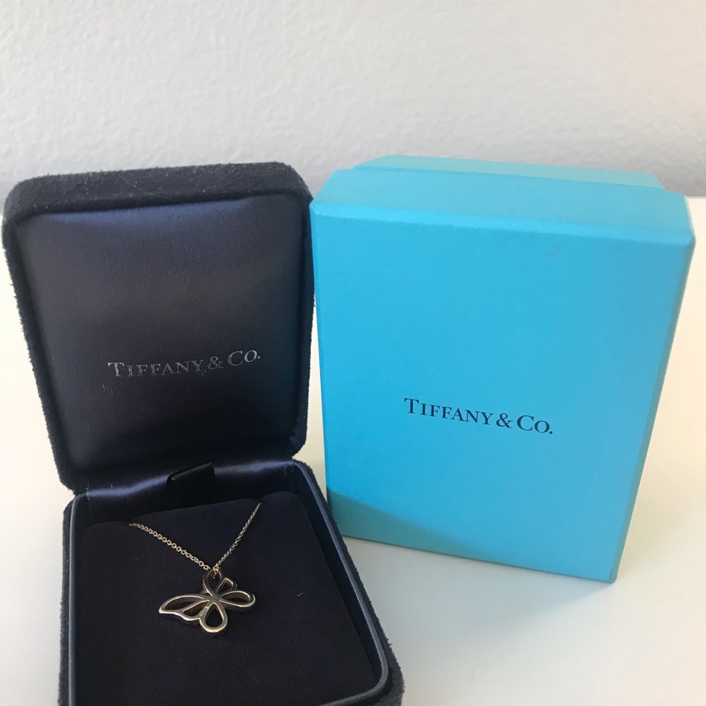 Tiffany 18K gold necklace with butterfly charm.